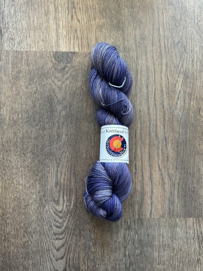 "Purple Snowflake" Hand dyed yarn by Get Knitfaced in CO